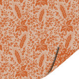 Cadeaupapier orange blaadjes